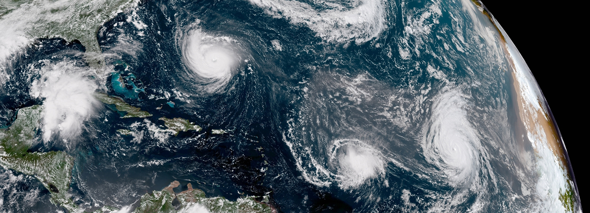 GOES East GeoColor satellite image of the Atlantic Ocean on September 11, 2018 showing Hurricanes Florence (L) and Helene (R) and Tropical Storm Isaac (center). Photo Credit: NOAA/NESDIS
