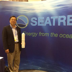 Yi Chao standing by Searec drop
